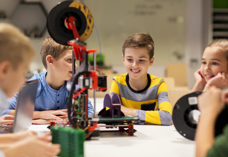 happy-children-with-3d-printer-at-robotics-school.jpg